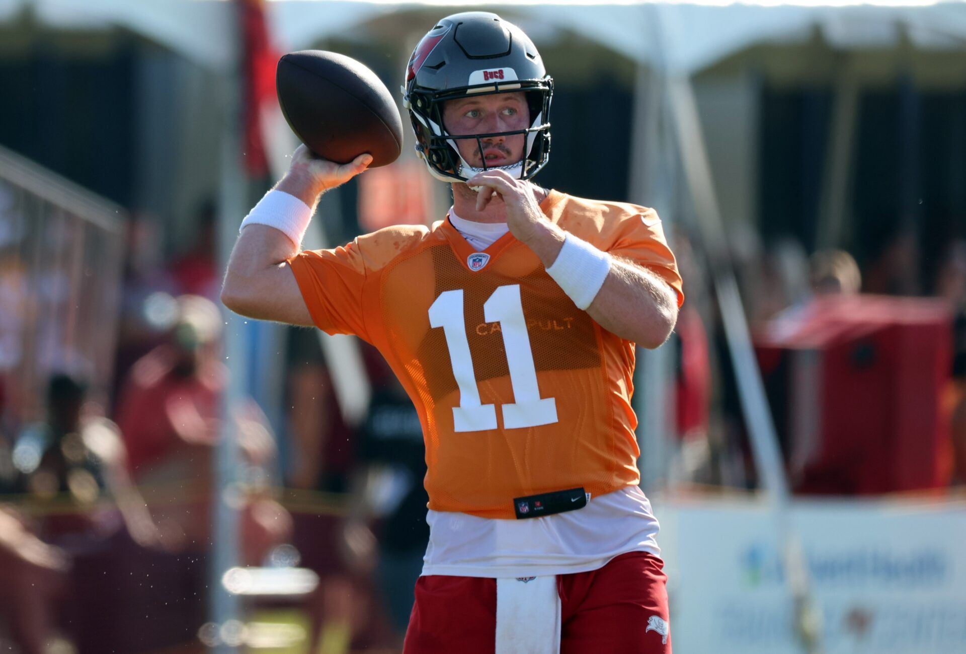 Tampa Bay Buccaneers QB John Wolford (11) throwing passes during training camp practice.