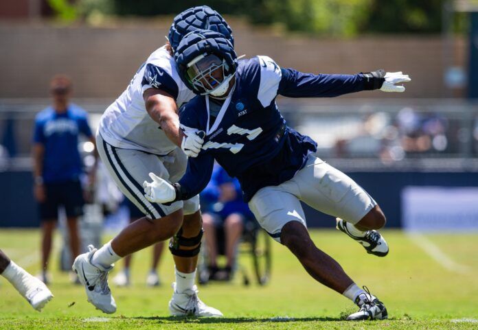 Micah Parsons (11) rushes against offensive tackle Terence Steele (78) during training camp at Marriott Residence Inn-River Ridge playing fields.