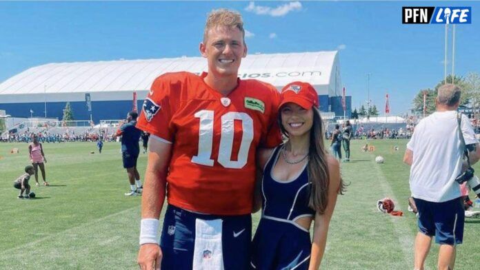 Mac Jones with girlfriend Sophie Scott at New England Patriots practice.