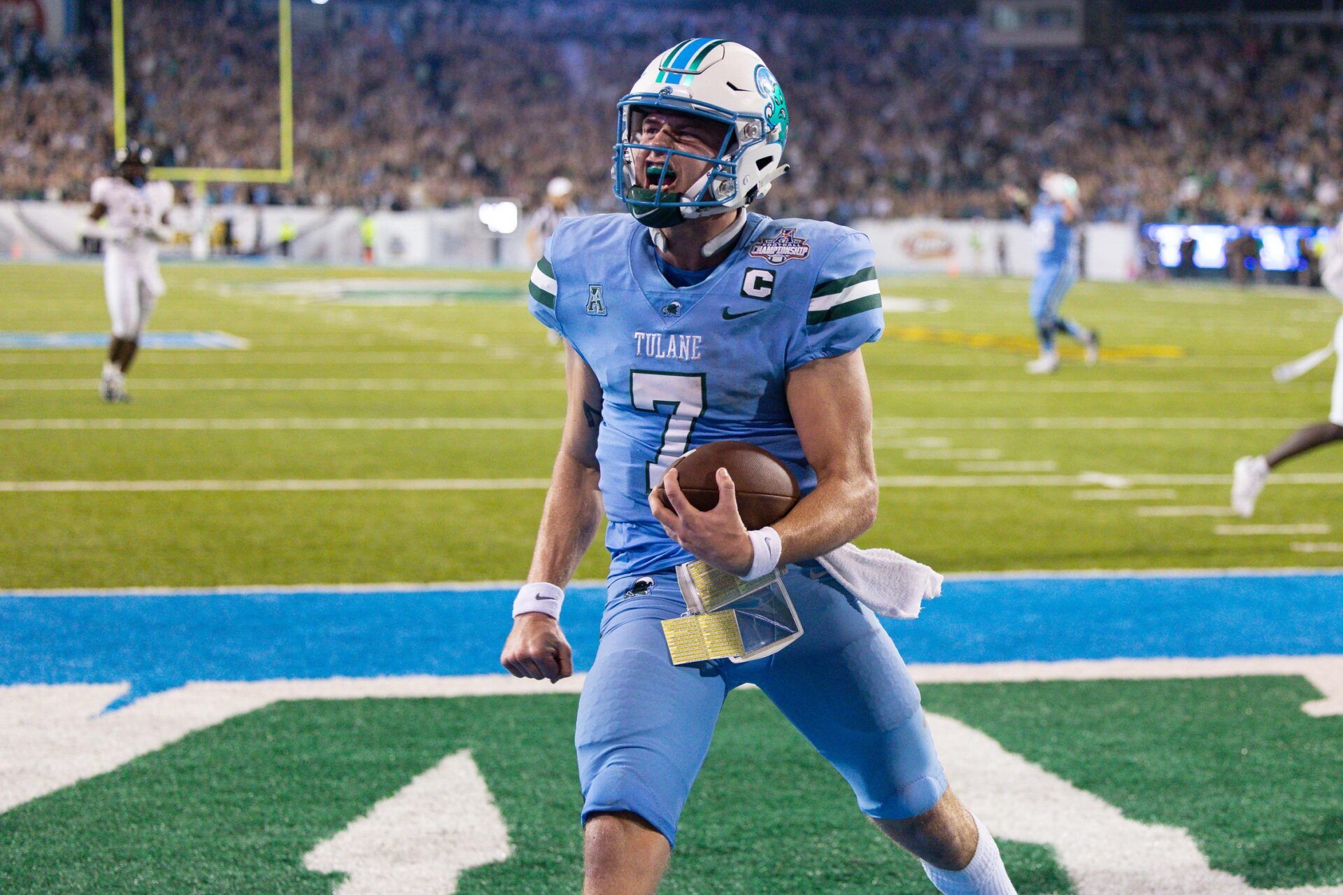 Michael Pratt (7) rushes in for a touchdown against the UCF Knights during the second half at Yulman Stadium.