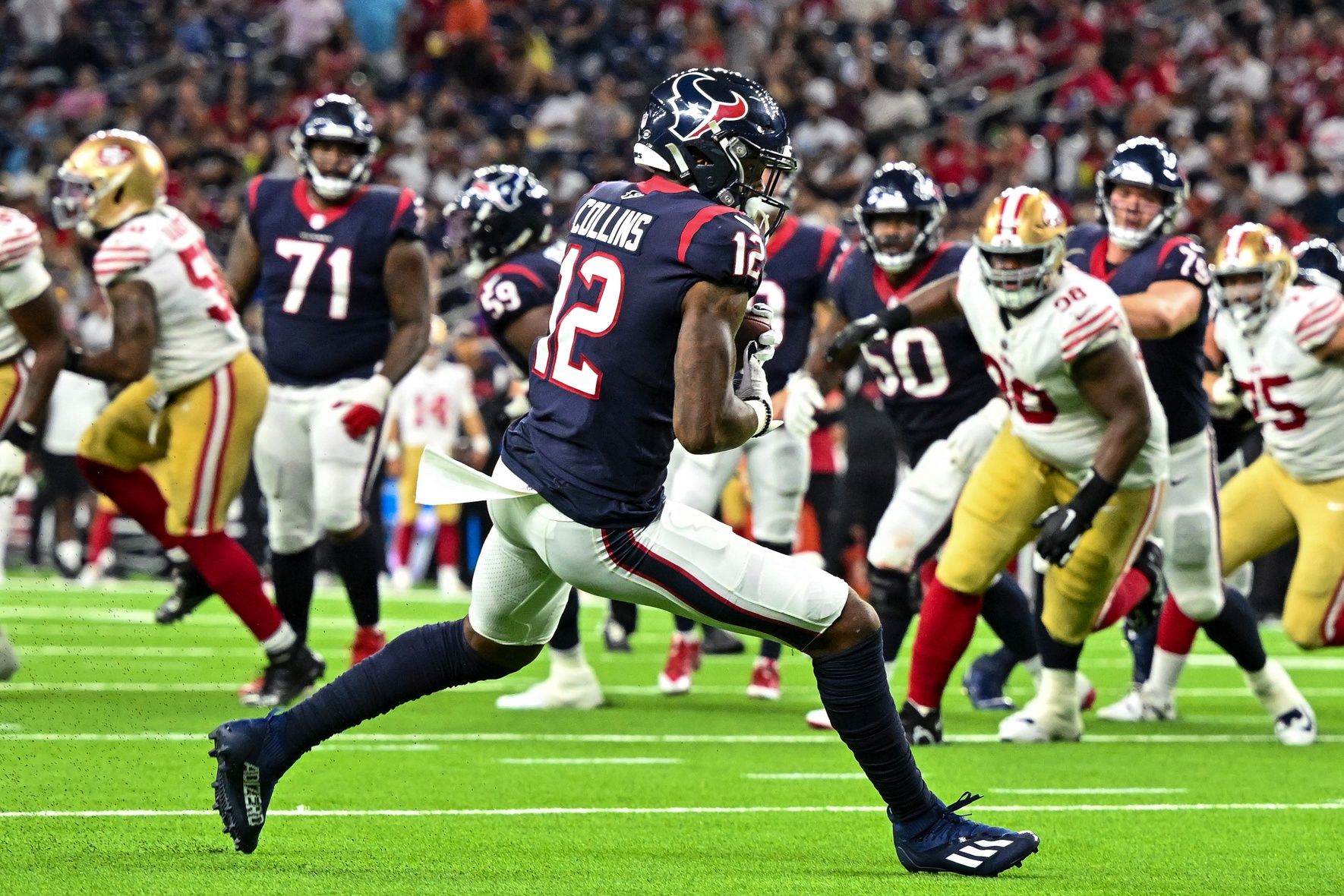 Houston Texans WR Nico Collins (12) catches a pass against the San Francisco 49ers.