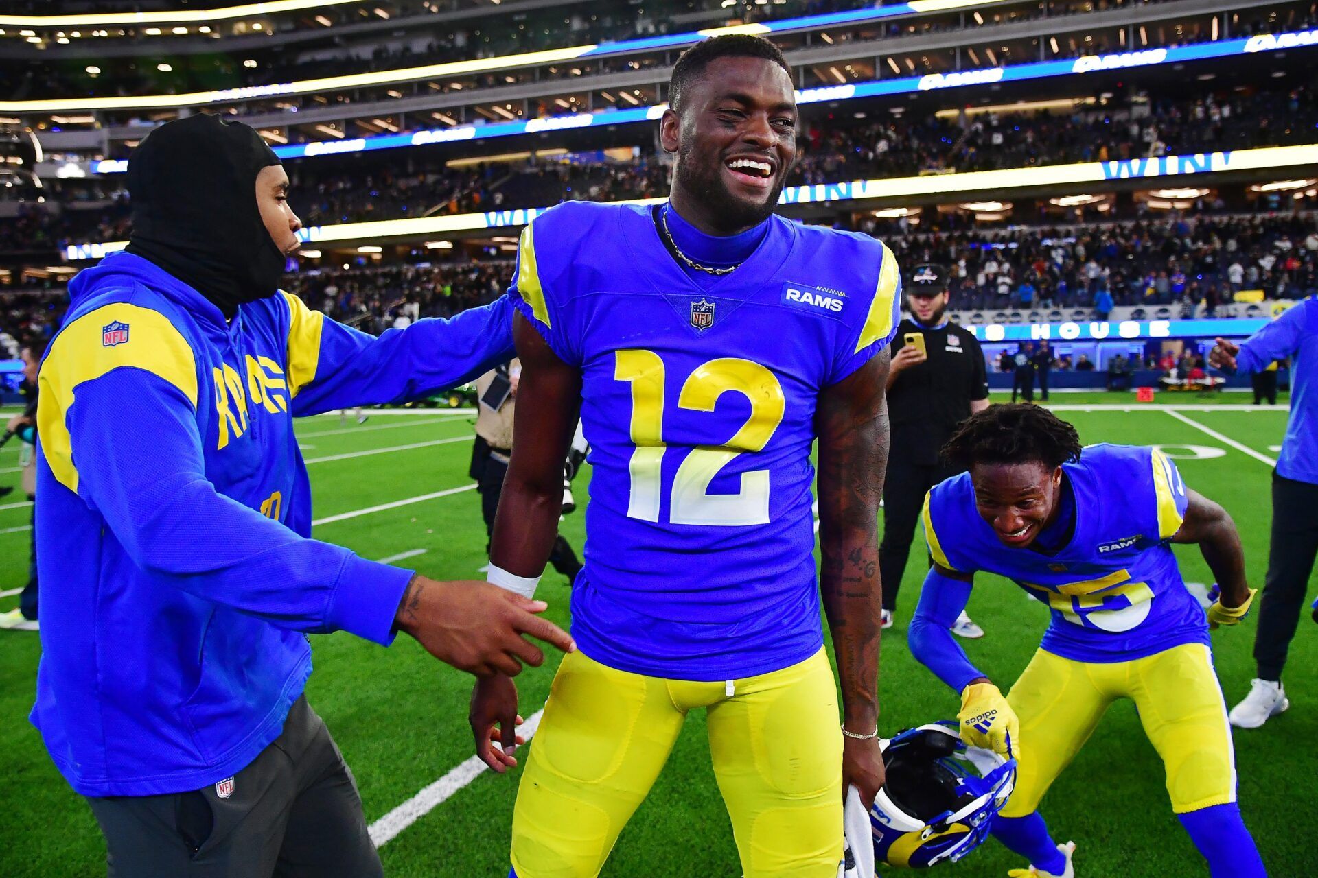 Los Angeles Rams WR Van Jefferson (12) celebrates with teammates after a victory over the Las Vegas Raiders.