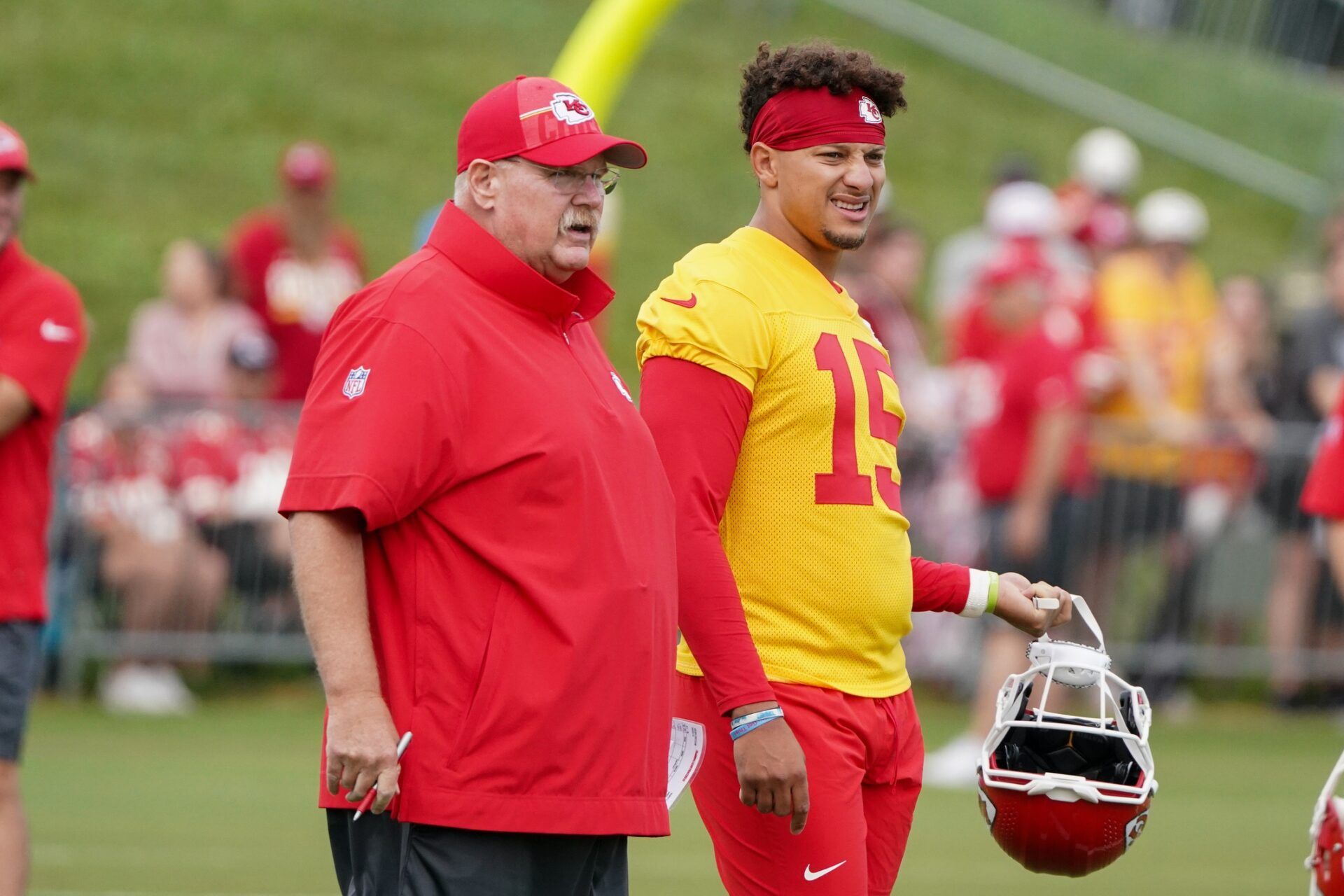 Kansas City Chiefs head coach Andy Reid and quarterback Patrick Mahomes look on during training camp.