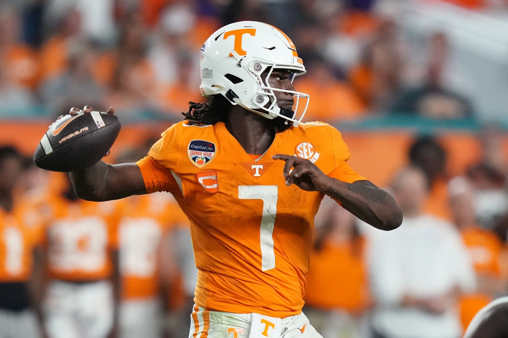 Joe Milton III (7) throws a pass against the Clemson Tigers during the second half of the 2022 Orange Bowl at Hard Rock Stadium.