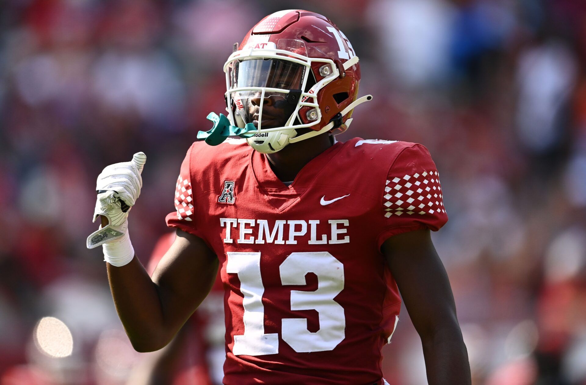 Layton Jordan (13) reacts against the Rutgers Scarlet Knights in the first half at Lincoln Financial Field.