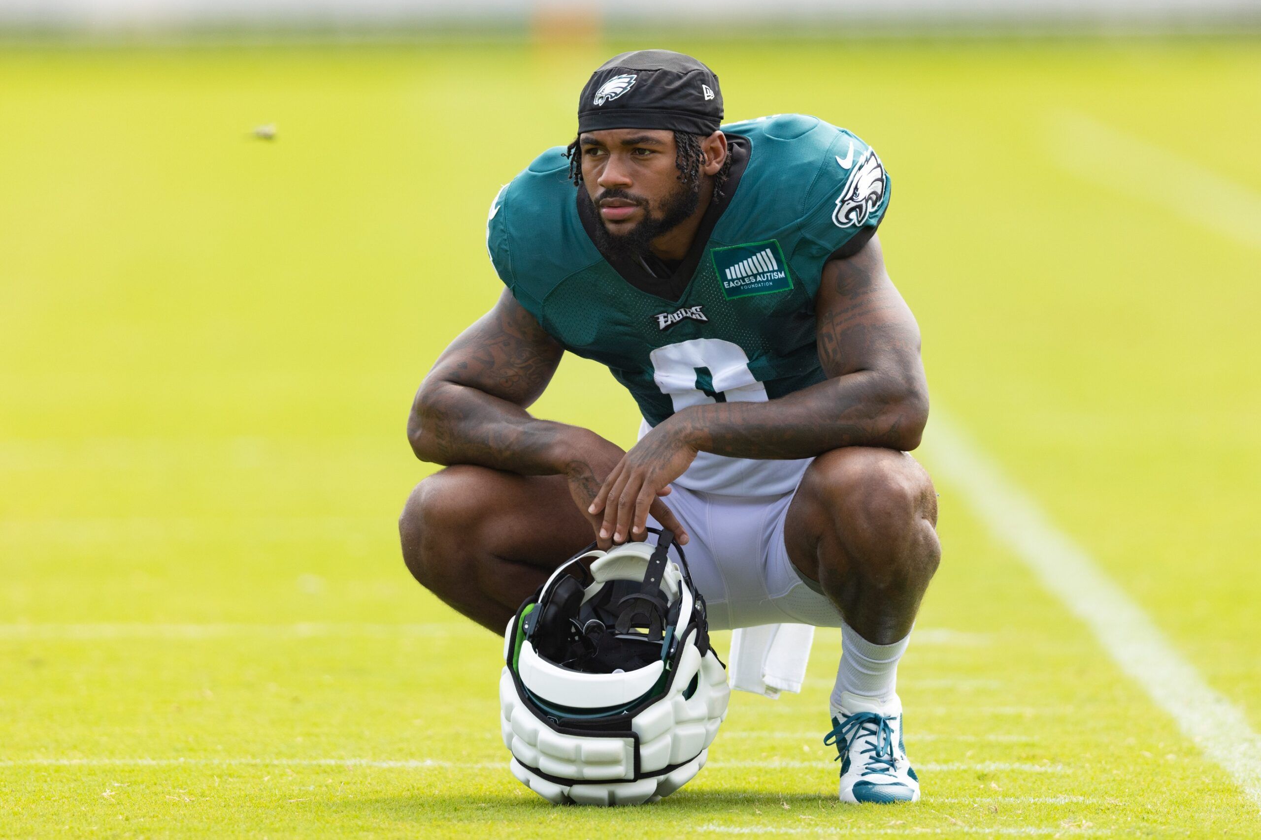 D'Andre Swift (0) takes a break during practice at Novacare Complex.