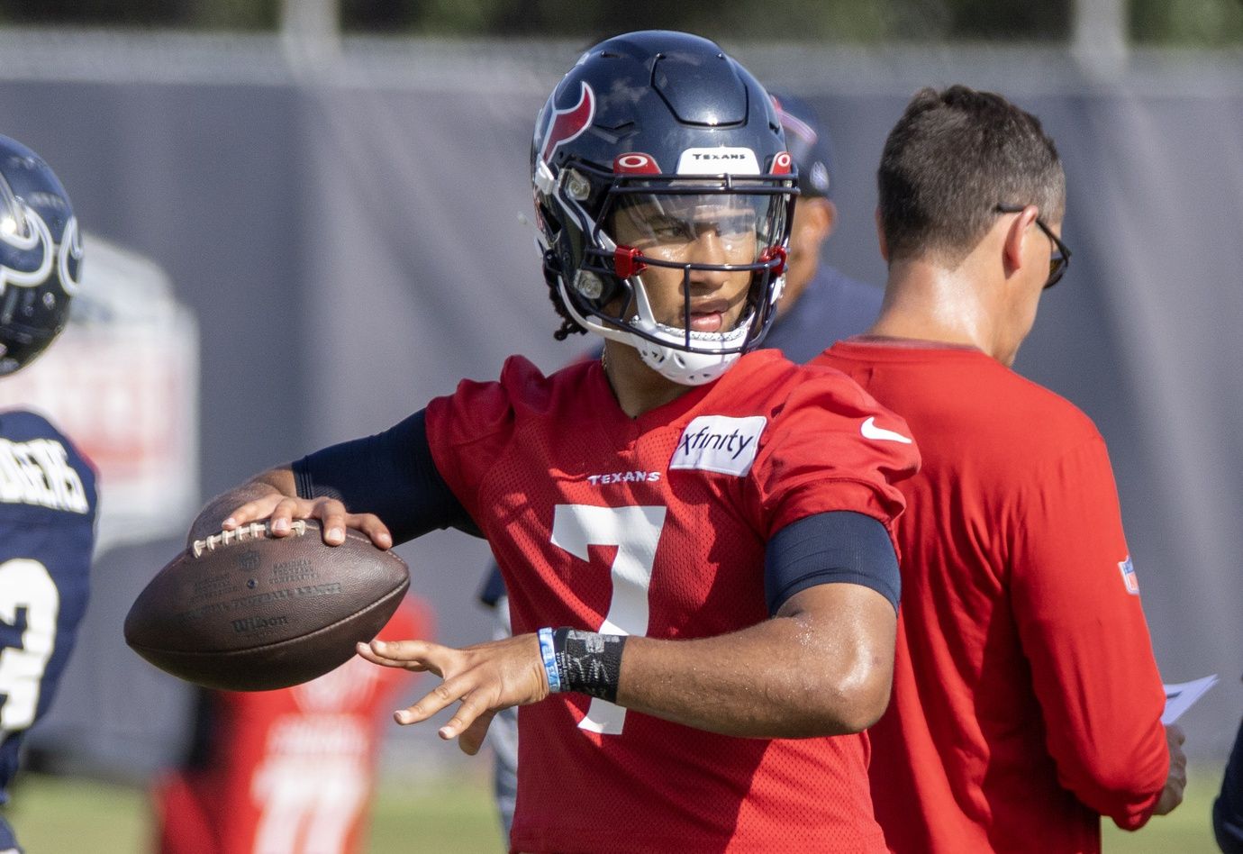 C.J. Stroud (7) drops back to pass during training camp at the Houston Methodist Training Center.