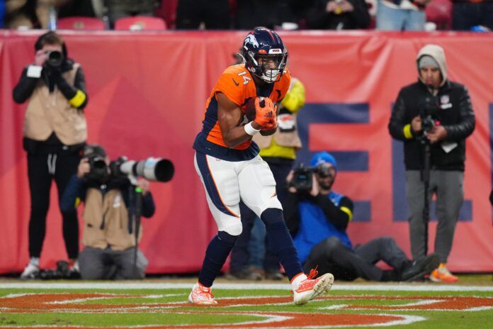 Courtland Sutton (14) catches a ball against the Los Angeles Chargers in the fourth quarter at Empower Field at Mile High.