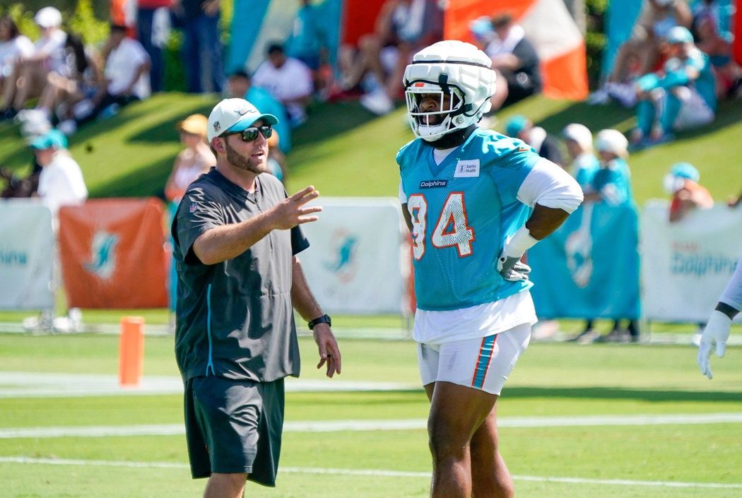 Miami Dolphins DT Christian Wilkins (94) talking to a coach during training camp.