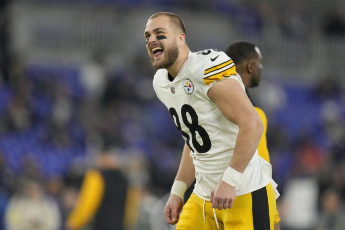 Pittsburgh Steelers TE Pat Freiermuth (88) gets hyped before a game against the Baltimore Ravens.