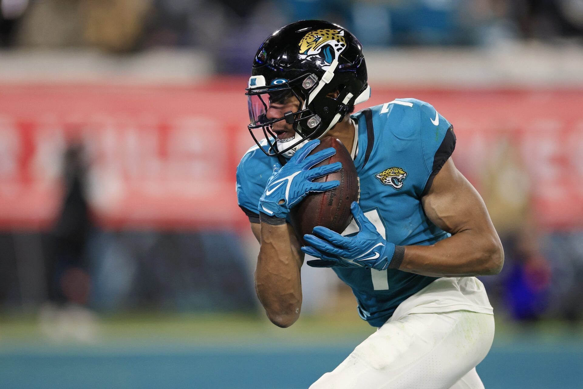 Jacksonville Jaguars wide receiver Zay Jones runs after the catch.