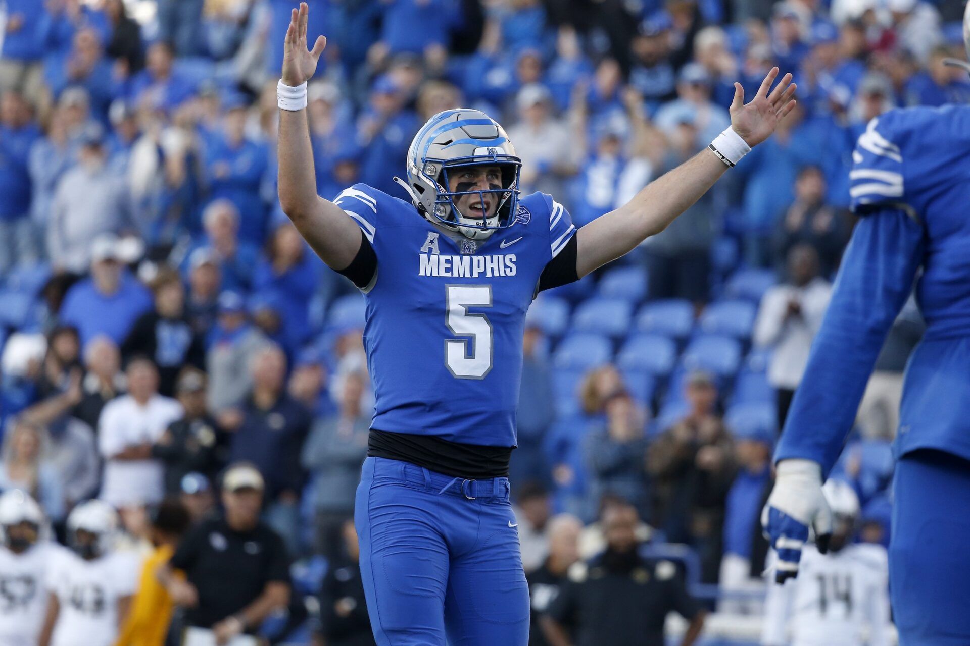 Seth Henigan (5) reacts after a touchdown during the second half against the UCF Knights at Liberty Bowl Memorial Stadium.