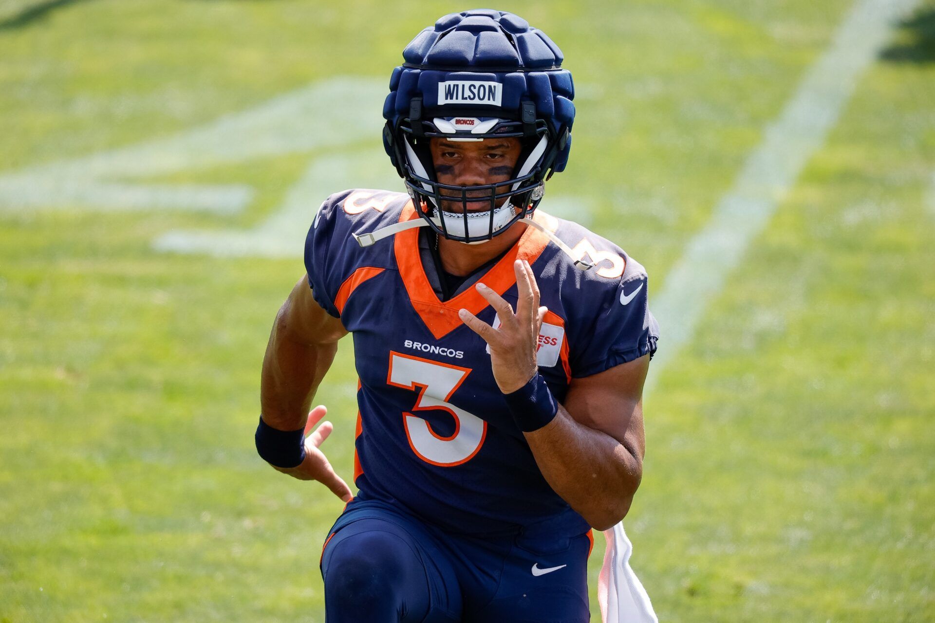 Russell Wilson (3) during training camp at Centura Health Training Center.