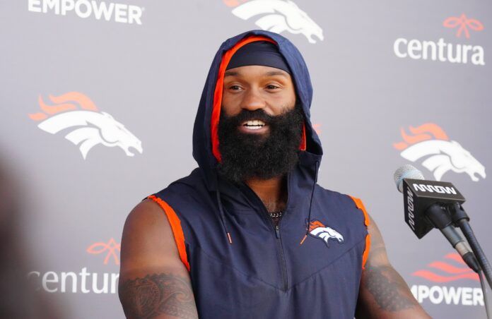 Denver Broncos RB Samaje Perine talks to the media during training camp.