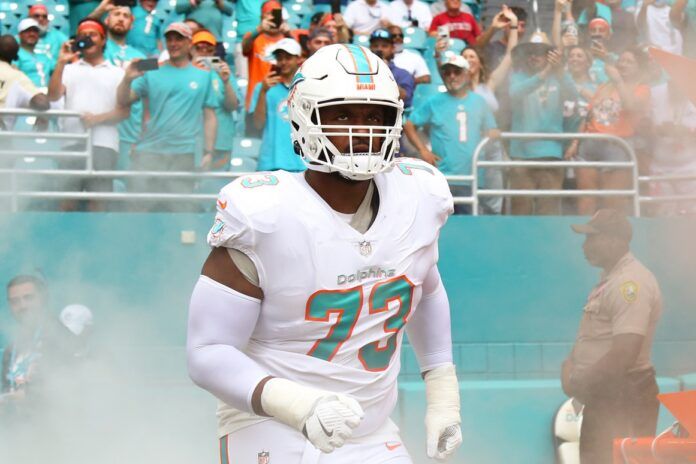 Miami Dolphins OT Austin Jackson (73) runs out onto the field.