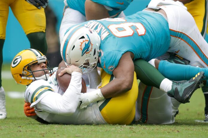 Miami Dolphins DT Christian Wilkins (94) sacks Green Bay Packers QB Aaron Rodgers (12).