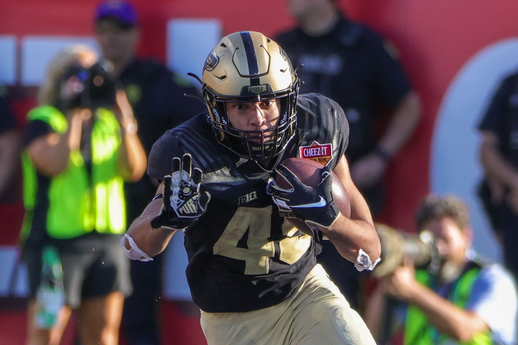 Purdue Boilermakers RB Devin Mockobee (45) carries the ball.