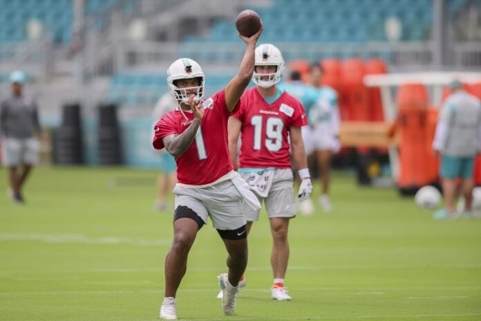 Tua Tagovailoa (1) works out during training camp at Baptist Health Training Facility.