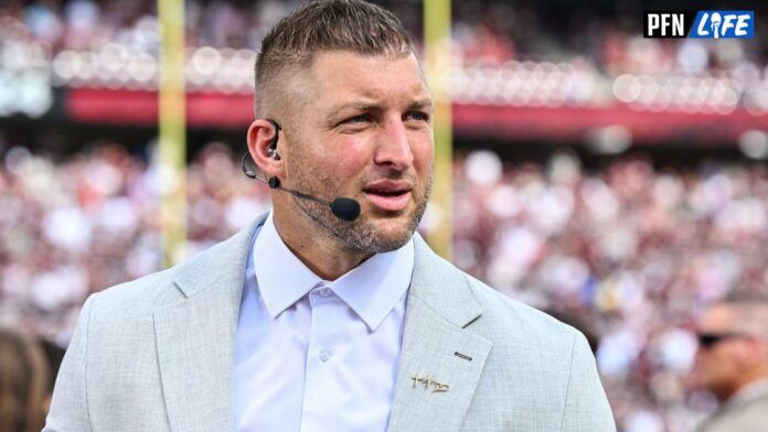 Sep 23, 2023; College Station, Texas, USA; SEC Nation Tim Tebow speaks on the sideline during pre-game between the Texas A&M Aggies and the Auburn Tigers at Kyle Field. Mandatory Credit: Maria Lysaker-USA TODAY Sports