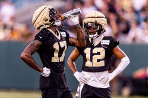 New Orleans Saints wide receiver A.T. Perry (17) takes a drink of water on a break during practice at Yulman Stadium (Tulane).