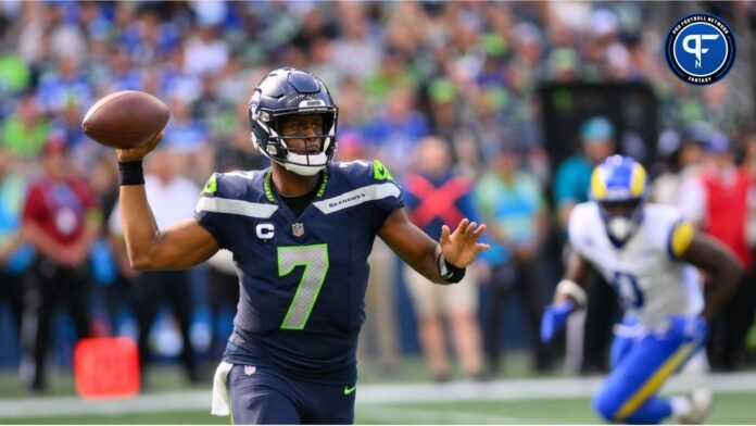 Seattle Seahawks quarterback Geno Smith (7) passes the ball against the Los Angeles Rams during the second half at Lumen Field.