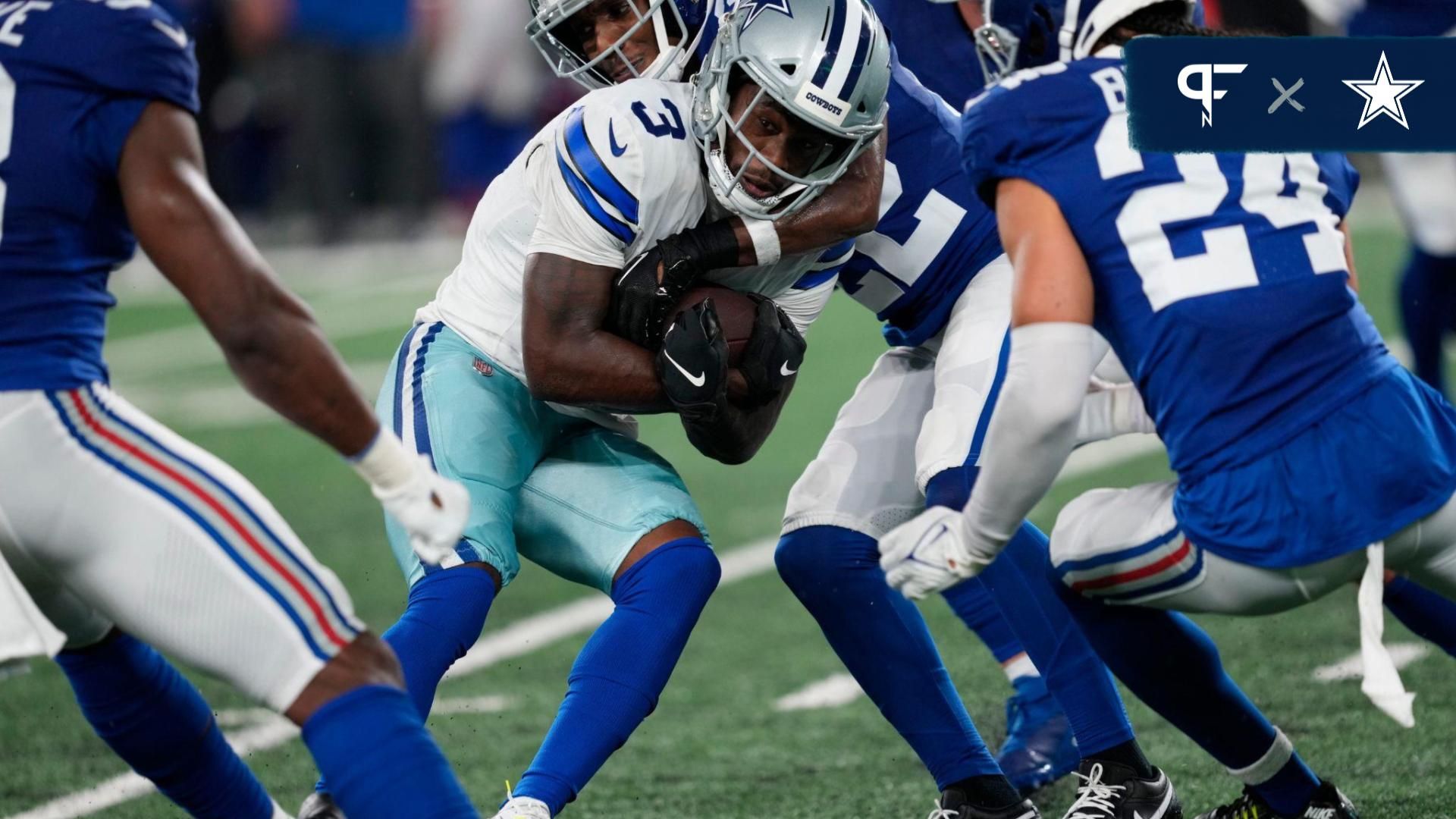 Brandin Cooks (3) runs with the ball until he is stopped by the members of the Giants defense.