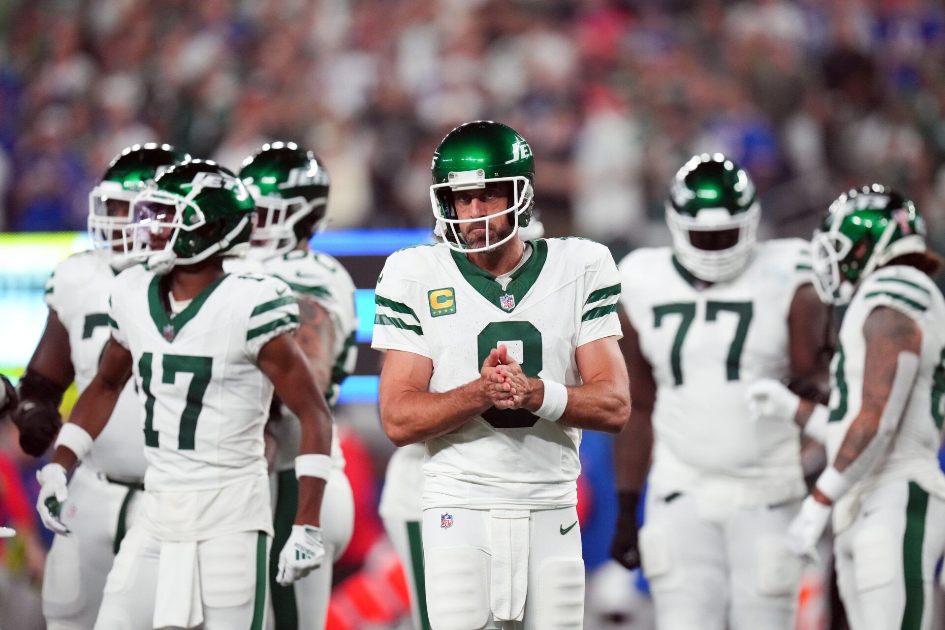 Aaron Rodgers (8) walks out onto the field with the offense to face the Buffalo Bills in the home opener at MetLife Stadium.