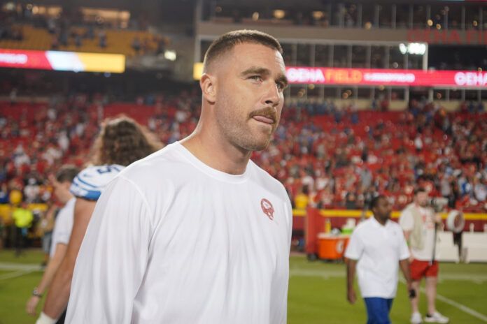 Kansas City Chiefs tight end Travis Kelce (87) on field against the Detroit Lions after the game at GEHA Field at Arrowhead Stadium.