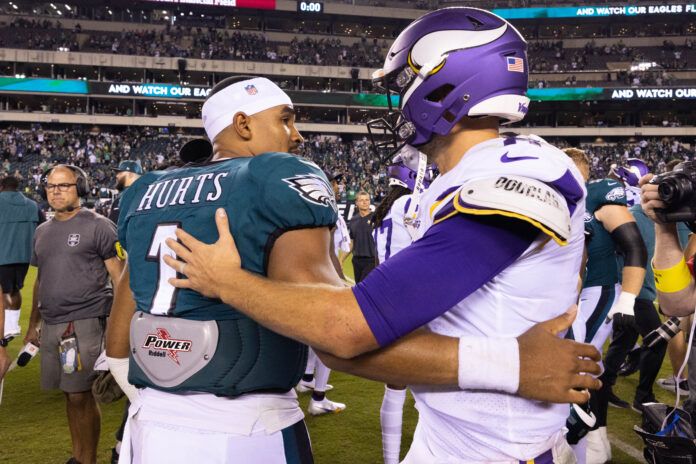 Philadelphia Eagles quarterback Jalen Hurts (1) and Minnesota Vikings quarterback Kirk Cousins (8) meet on the field after the game at Lincoln Financial Field.