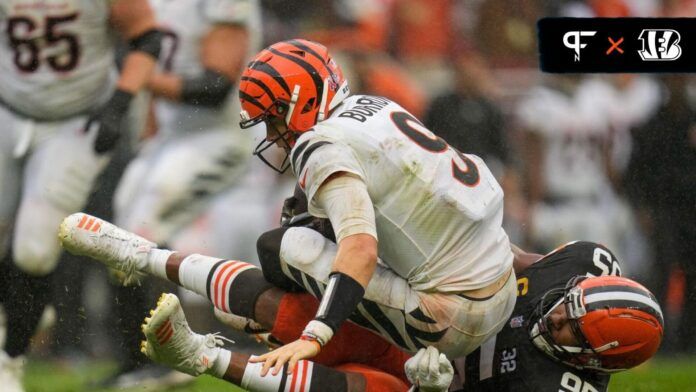 Cincinnati Bengals quarterback Joe Burrow (9) is sacked by Cleveland Browns defensive end Myles Garrett (95) to turnover on downs in the fourth quarter of the NFL Week 1 game between the Cleveland Browns and the Cincinnati Bengals at FirstEnergy Stadium in downtown Cleveland on Sunday, Sept. 10, 2023. The Browns dealt the Bengals a 24-3 loss to begin the season.