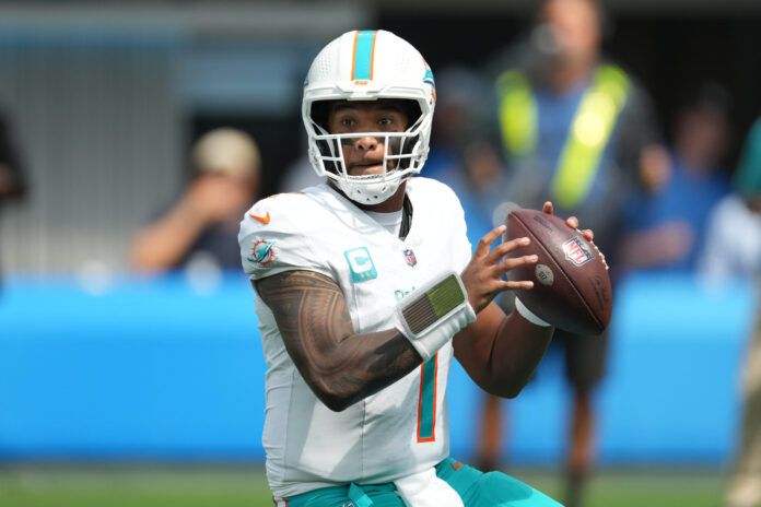 Sep 10, 2023; Inglewood, California, USA; Miami Dolphins quarterback Tua Tagovailoa (1) throws the ball against the Los Angeles Chargers at SoFi Stadium. Mandatory Credit: Kirby Lee-USA TODAY Sports