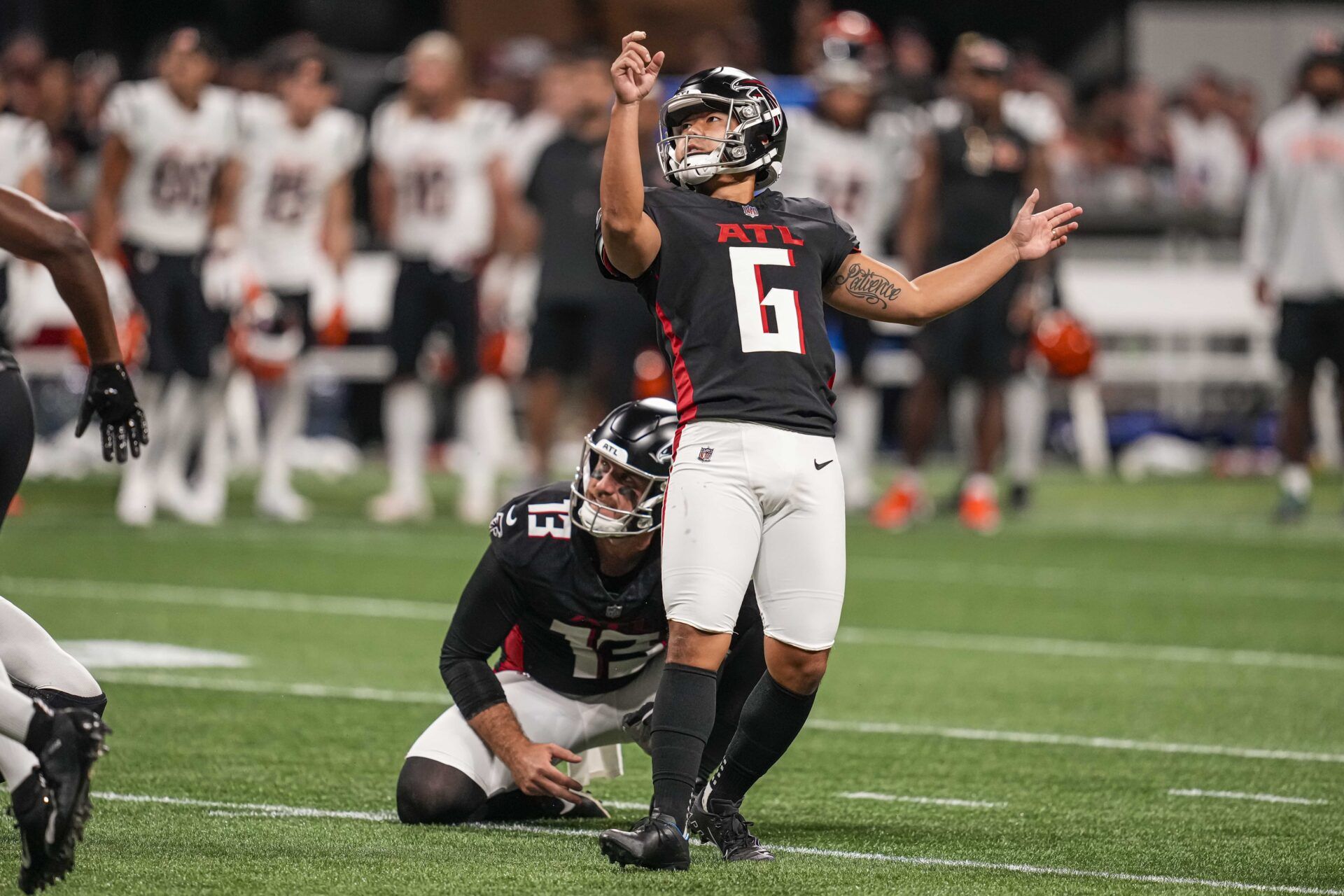 Atlanta Falcons kicker Younghoe Koo (6) kicks a field goal.