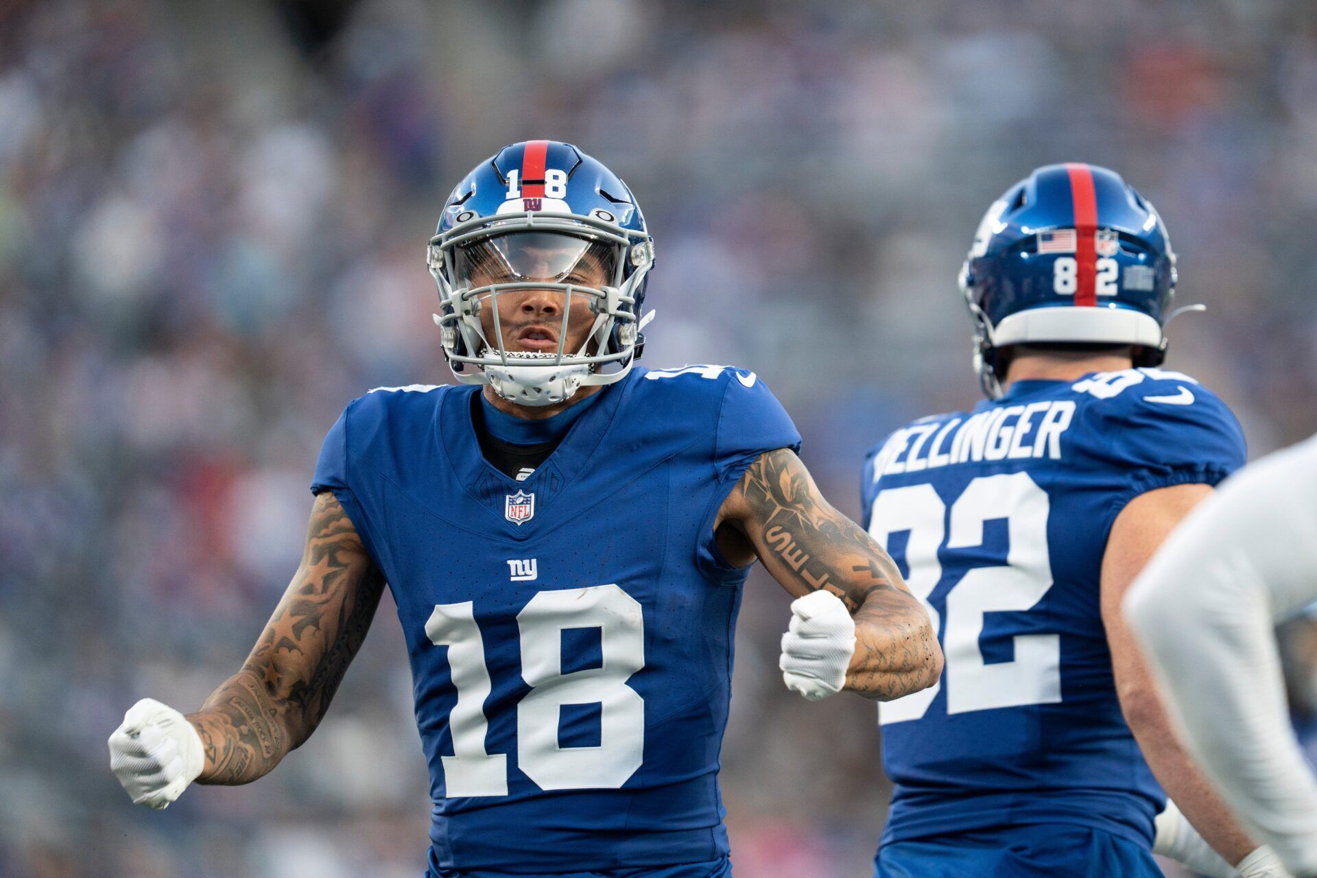 New York Giants WR Isaiah Hodgins (18) celebrates after a play.