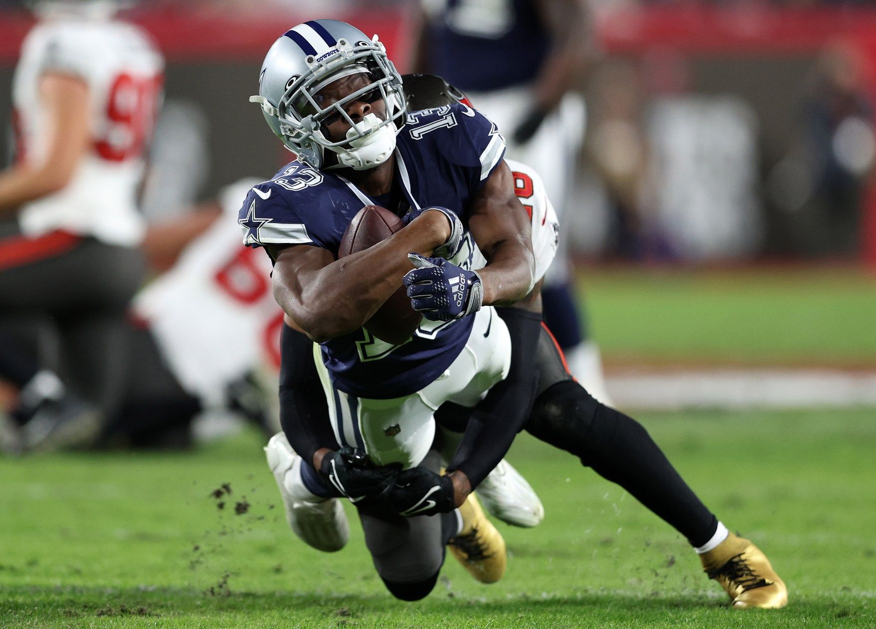 Dallas Cowboys wide receiver Michael Gallup (13) makes a catch against the Tampa Bay Buccaneers in the first half during the wild card game at Raymond James Stadium.