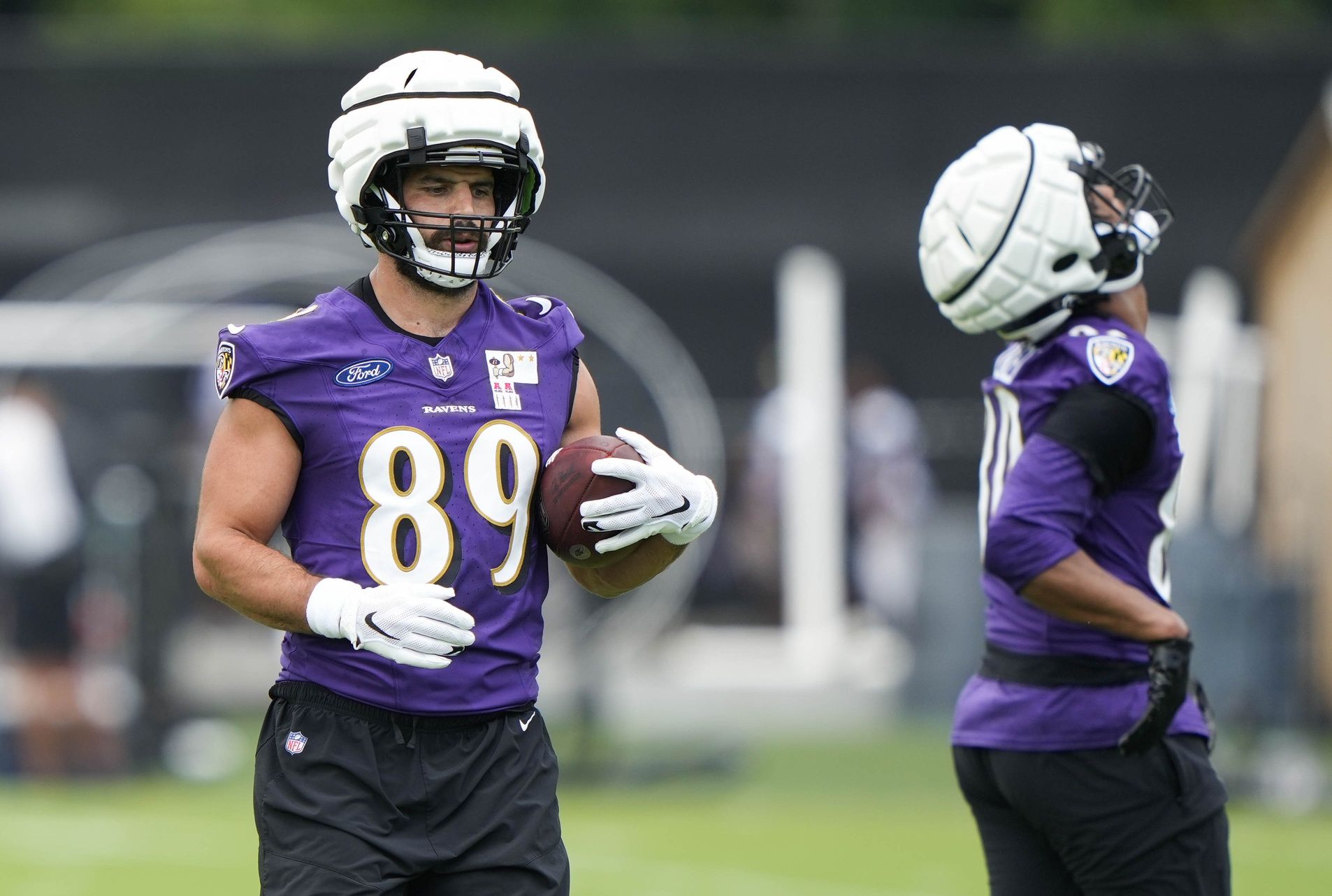 Baltimore Ravens TE Mark Andrews (89) catches a pass during training camp.