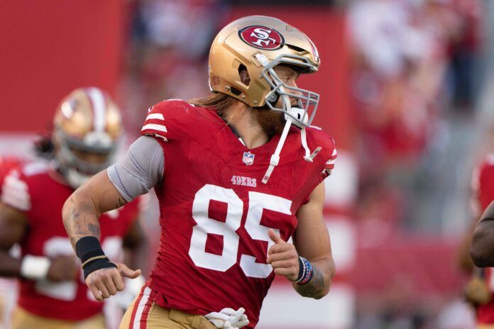 Aug 25, 2023; Santa Clara, California, USA; San Francisco 49ers tight end George Kittle (85) runs out of the tunnel before the start of the first quarter against the Los Angeles Chargers at Levi's Stadium. Mandatory Credit: Stan Szeto-USA TODAY Sports