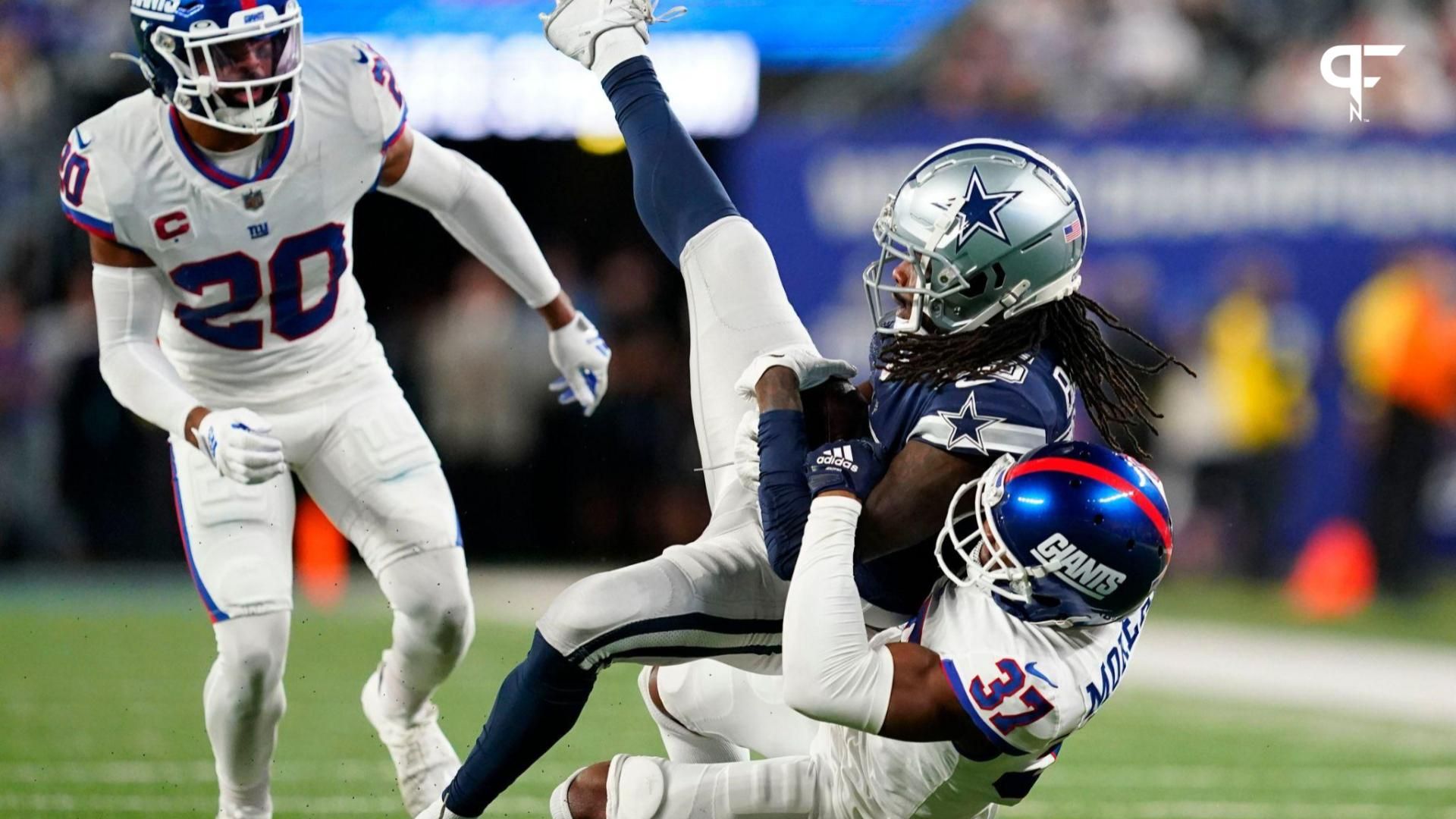 New York Giants cornerback Fabian Moreau (37) tackles Dallas Cowboys wide receiver Noah Brown (85) in the second half. The Giants fall to the Cowboys, 23-16, at MetLife Stadium on Monday, Sept. 26, 2022.