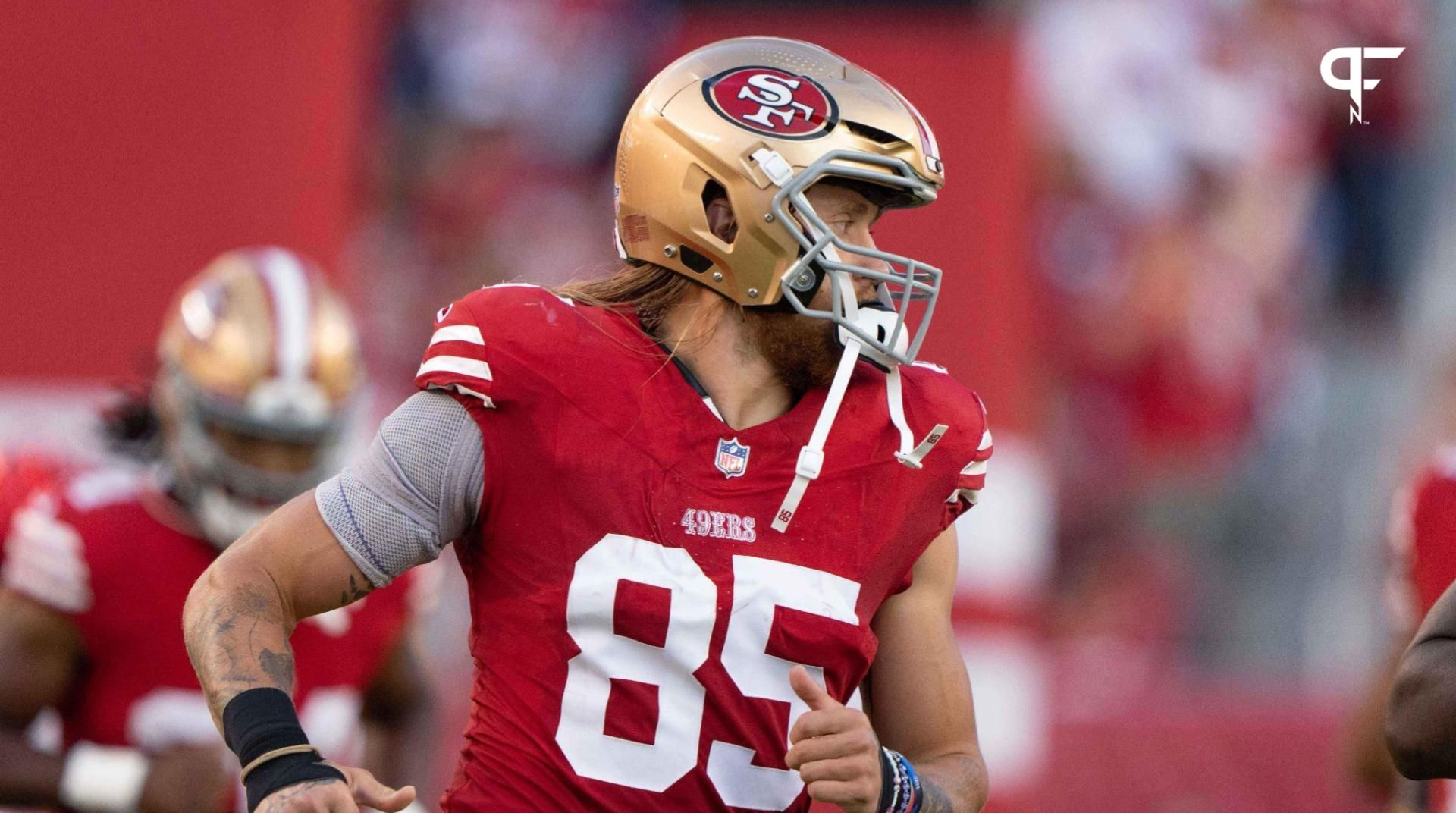 San Francisco 49ers tight end George Kittle (85) runs out of the tunnel before the start of the first quarter against the Los Angeles Chargers at Levi's Stadium.