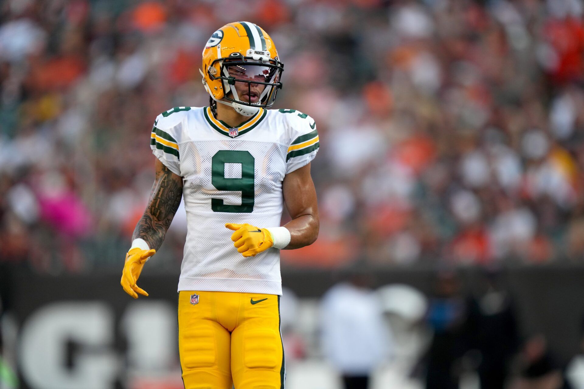 Christian Watson (9) lines up for a play in the first quarter during a Week 1 NFL preseason game between the Green Bay Packers and the Cincinnati Bengals.