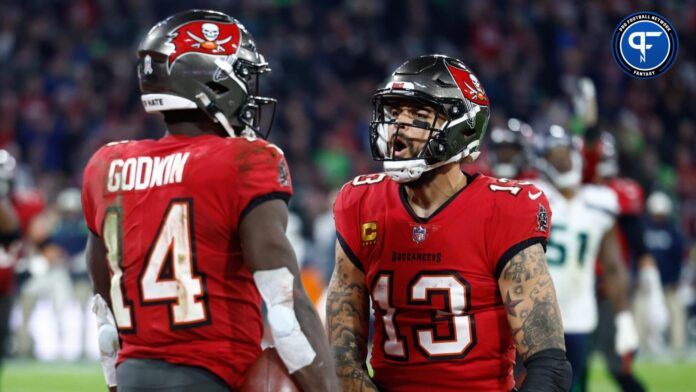 Tampa Bay Buccaneers wide receiver Chris Godwin (14) celebrates his touchdown with teammate wide receiver Mike Evans (13) against the Seattle Seahawks during the fourth quarter of an International Series game at Allianz Arena.