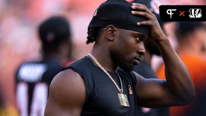 Chidobe Awuzie (22) looks on while dressed out in the fourth quarter of the NFL preseason week 3 game between the Cincinnati Bengals and the Washington Commanders.