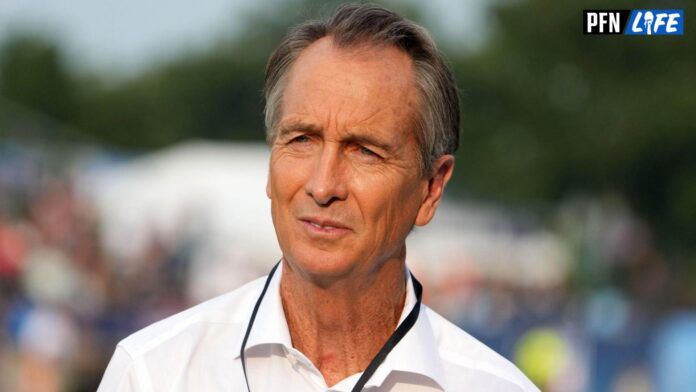 Cris Collinsworth watches from the sidelines during a preseason game between the Cleveland Browns and the New York Jets at Tom Benson Hall of Fame Stadium.