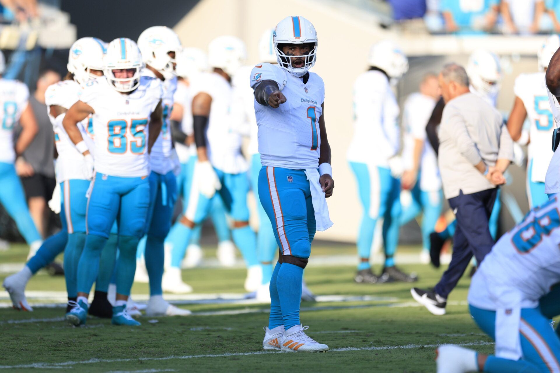 Miami Dolphins quarterback Tua Tagovailoa (1) directs before the game of a preseason matchup Saturday, Aug. 26, 2023 at EverBank Stadium in Jacksonville, Fla.