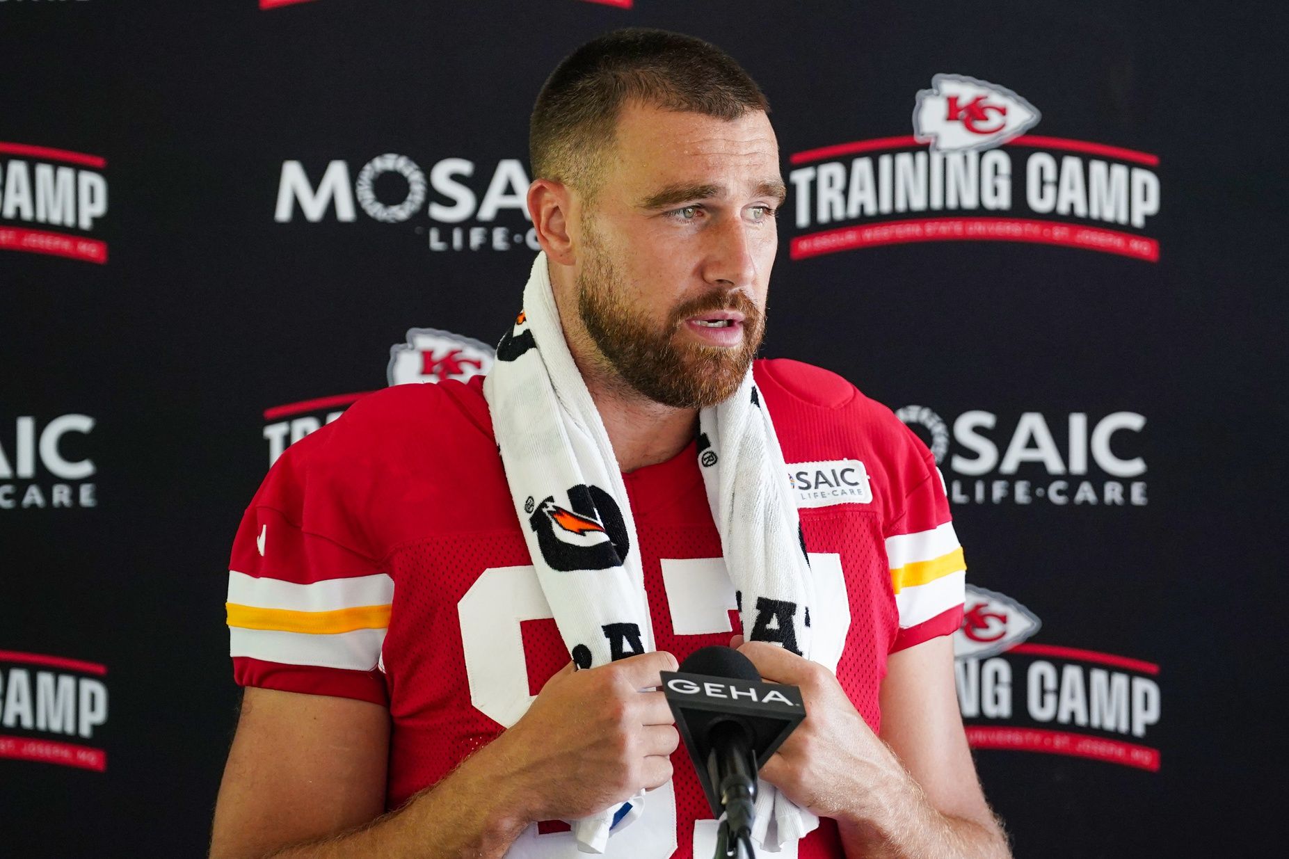 Kansas City Chiefs tight end Travis Kelce (87) answers questions from reporters during training camp at Missouri Western State University.