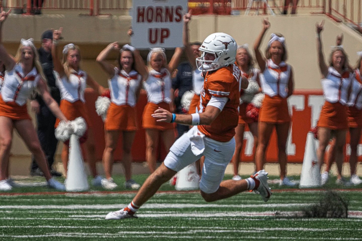 Quinn Ewers (3) runs the ball during the game against Rice at Royal-Memorial Stadium.
