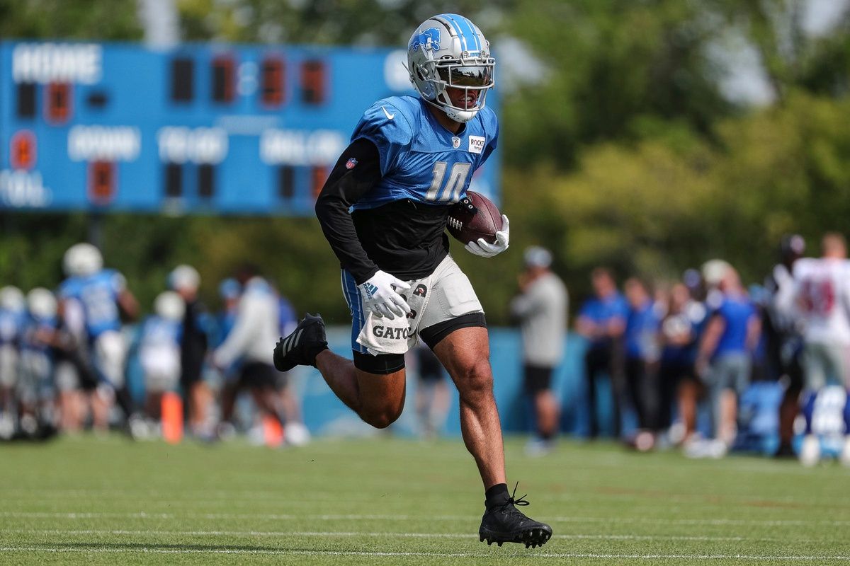 Detroit Lions wide receiver Amon-Ra St. Brown runs a drill during joint practice with New York Giants.