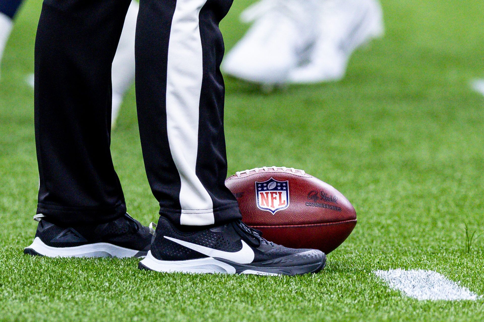 Aug 27, 2023; New Orleans, Louisiana, USA; The NFL football ready to be put into play by the referee during the first half of the game against the New Orleans Saints and Houston Texans at the Caesars Superdome. Mandatory Credit: Stephen Lew-USA TODAY Sports