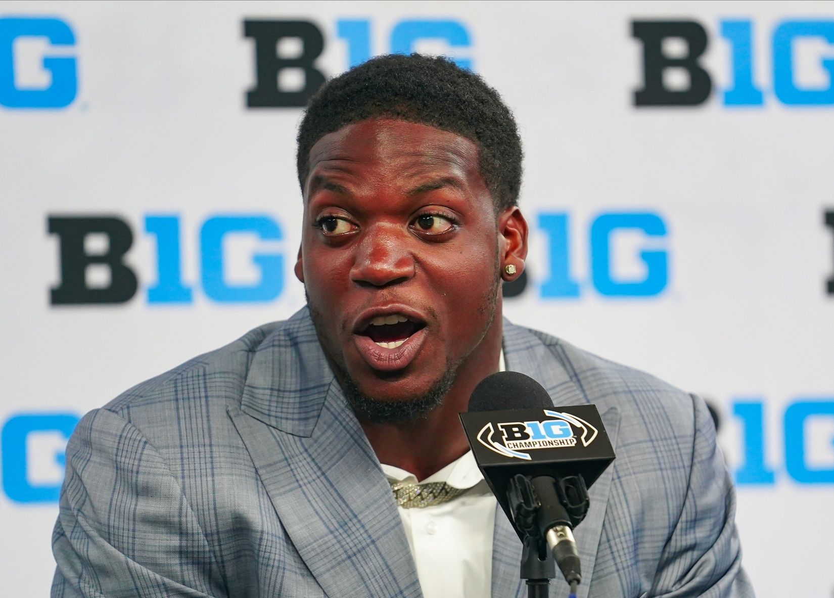 Adisa Isaac speaks to the media during the Big 10 football media day at Lucas Oil Stadium.