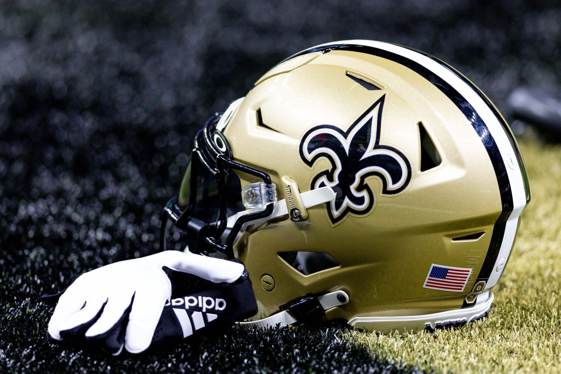 Detailed view of the New Orleans Saints helmet and glove during pregame against the Kansas City Chiefs at the Caesars Superdome.