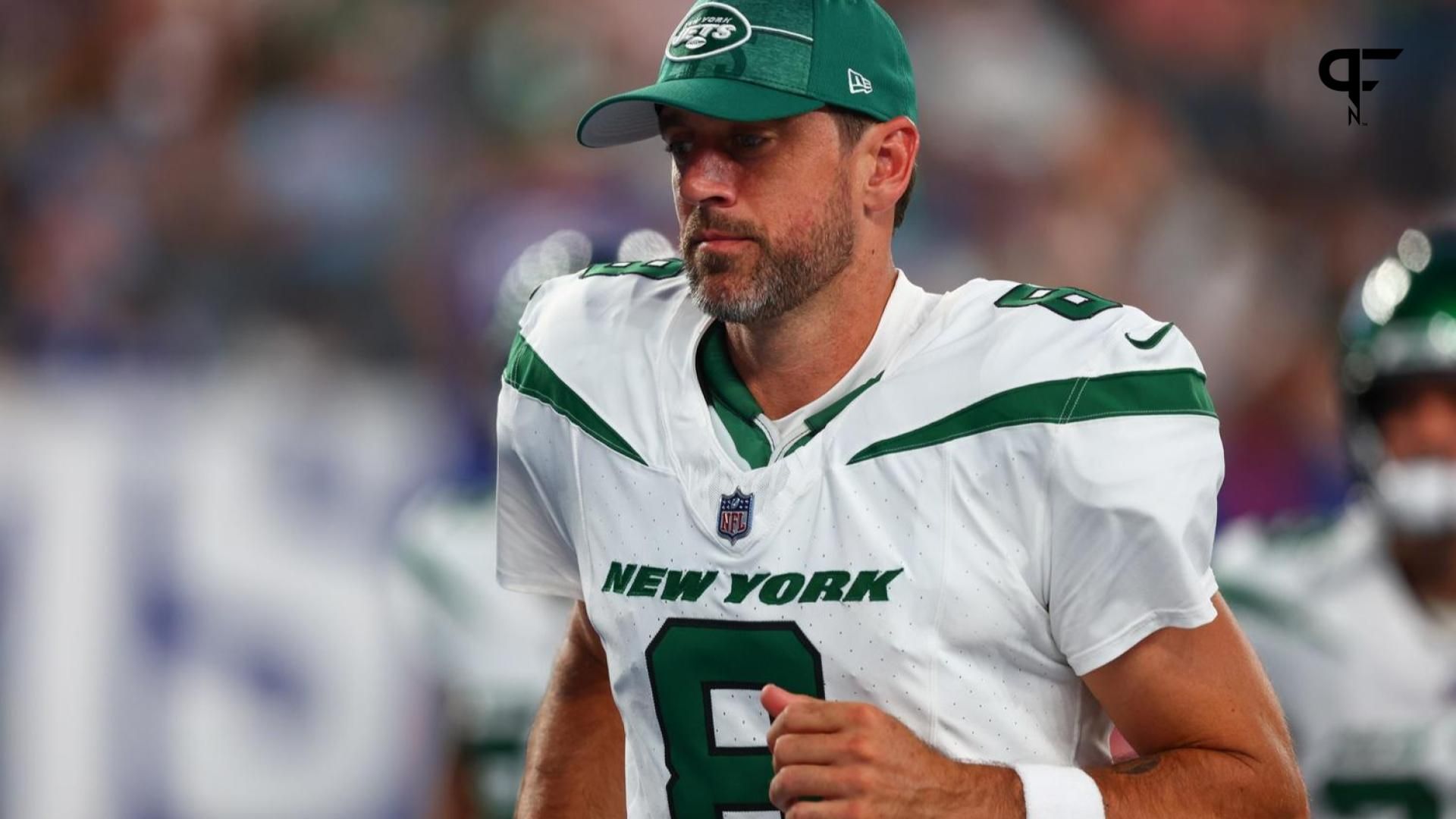 New York Jets quarterback Aaron Rodgers (8) leaves the field after the first half of their game against the New York Giants at MetLife Stadium.